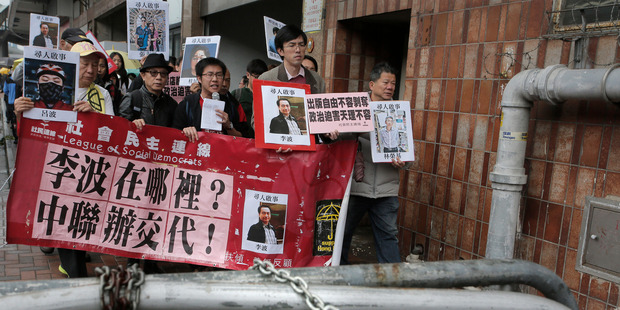 Protesters calling for the release of Lee Bo and his colleagues have taken to the streets of Hong Kong