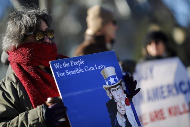 Protesters demonstrate in front of the White House for gun control