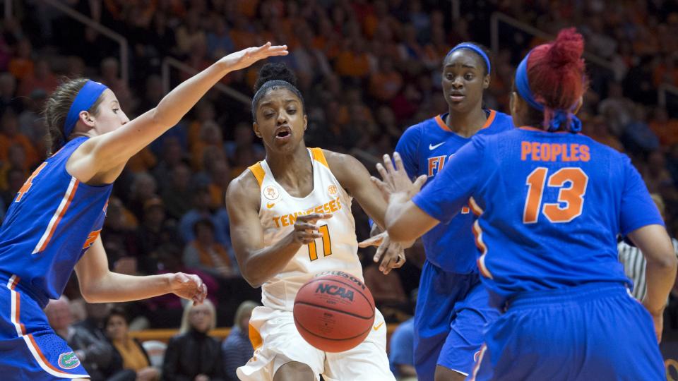 Tennessee's Diamond De Shields loses the ball as she comes up against Florida defenders from left Haley Lorenzen Ronni Williams and Cassie Peoples during an NCAA college basketball game in Knoxville Tenn. on Thursday Jan. 7 2016. Florida beat Tenne