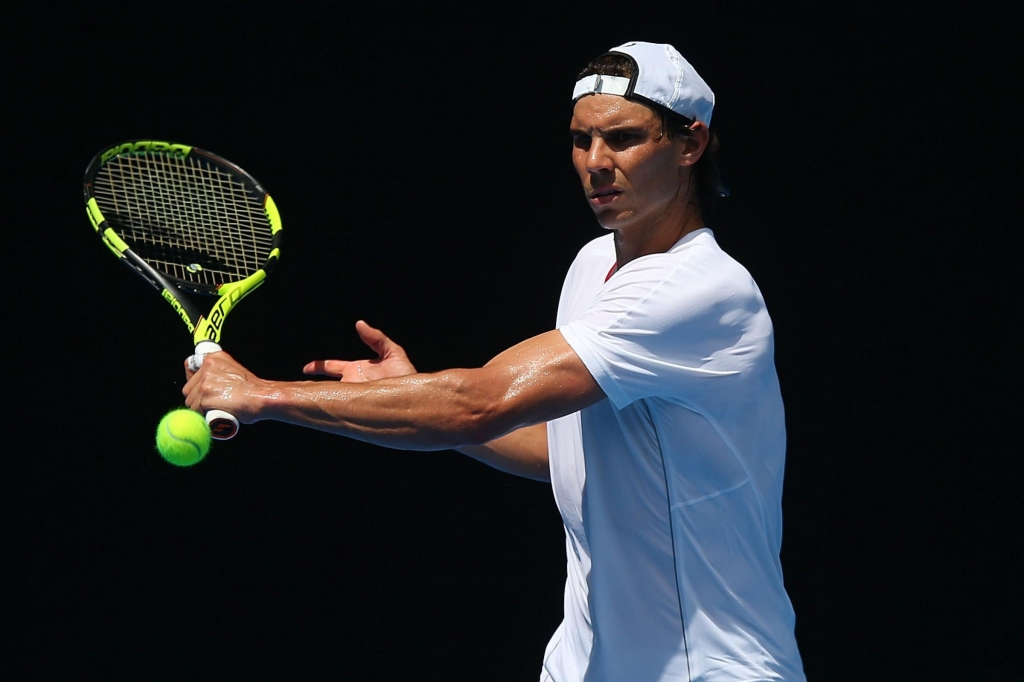 Rafael Nadal of Spain hits a backhand during a practice session ahead of the 2016 Australian Open at Melbourne Park