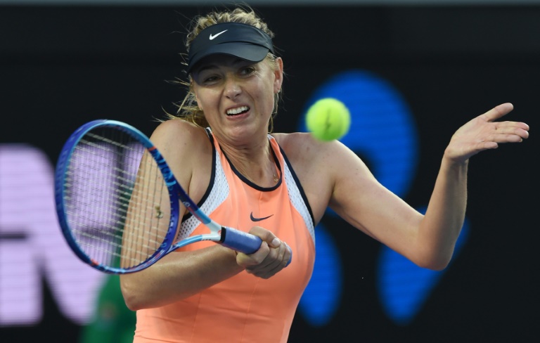 AFP  Greg WoodRussia's Maria Sharapova plays a forehand to Japan's Hibino Nao on day one of the 2016 Australian Open in Melbourne