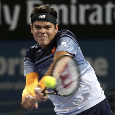 Milos Raonic of Canada plays a shot