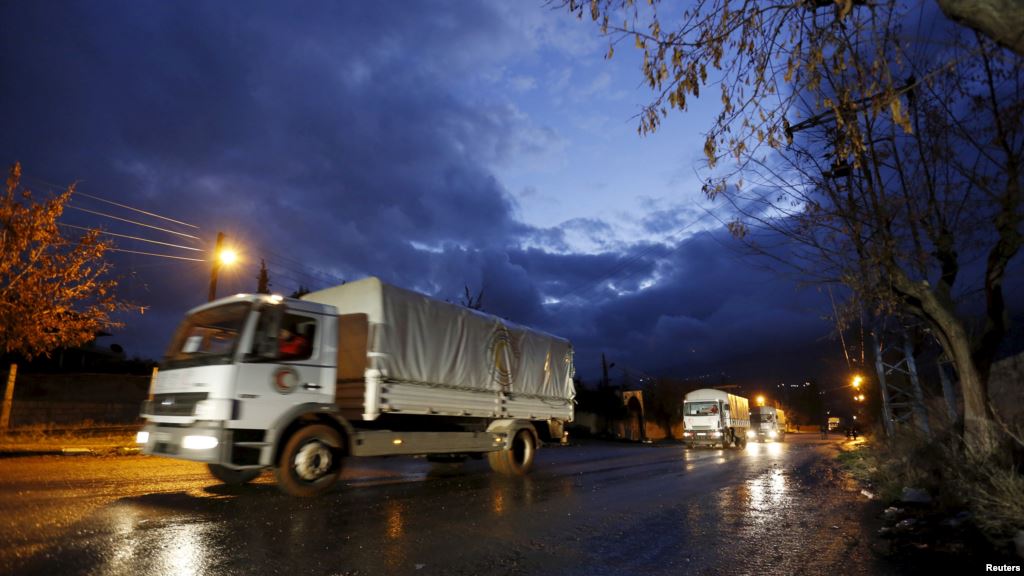 Red Crescent aid convoy enters Madaya Syria Jan. 14 2016