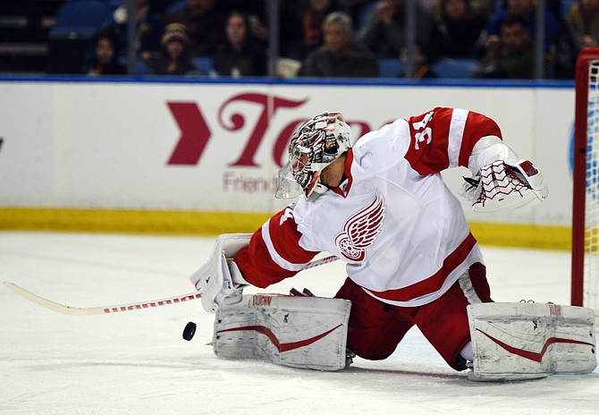 Detroit Red Wings goaltender Petr Mrazek makes a save during the first period against the Buffalo Sabres Saturday Jan. 2 2016 in Buffalo N.Y. Detroit won 4-3