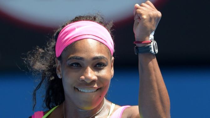 Serena Williams celebrates after a victory in her women's singles match against Slovakia's Dominika Cibulkova on day 10 of the 2015 Australian Open