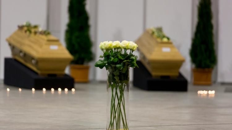 Coffins with the remains of ten German tourists killed in a suicide bomb attack in Istanbul laid out in a hangar at Berlin's Tegel Airport