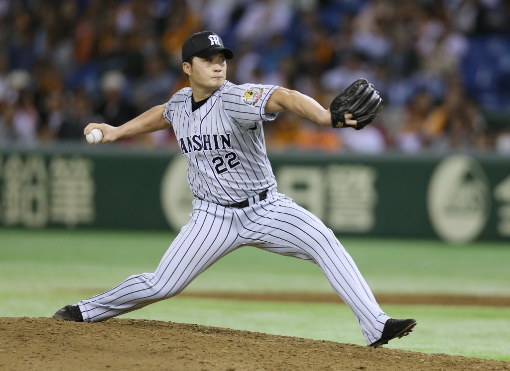 3 2015 shows South Korean pitcher Oh Seung Hwan of the Hanshin Tigers in the Nippon Professional Baseball league throwing against the Yomiuri Giants at the Tokyo Dome. The star South Korean pitcher pursuing a US major league