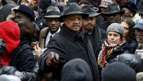 Rev. Jesse Jackson joins demonstrators in a protest to disrupt Black Friday shopping in Chicago Illinois Nov. 27 2015