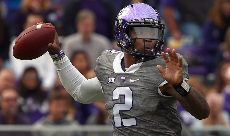 FORT WORTH TX- NOVEMBER 14 Trevone Boykin #2 of the TCU Horned Frogs looks for an open receiver against the Kansas Jayhawks in the first quarter at Amon G. Carter Stadium