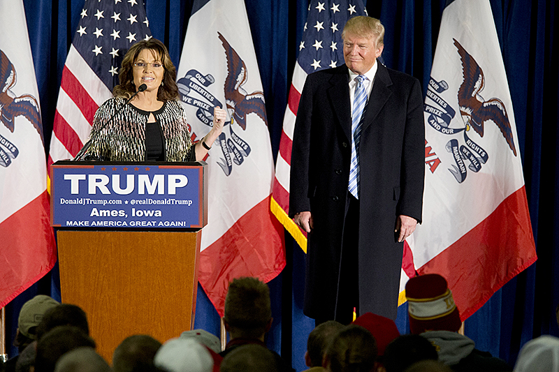 Former Alaska Gov. Sarah Palin left endorses Republican presidential candidate Donald Trump during a rally at the Iowa State University on Tuesday