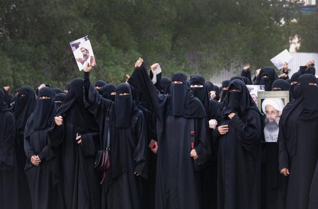 Saudi Shia women march in protest against the execution of a top Shia cleric