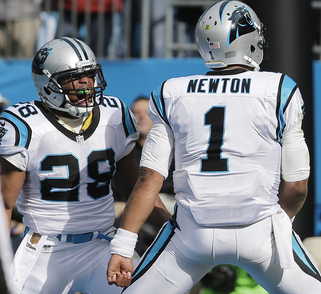 Carolina Panthers running back Jonathan Stewart celebrates his touchdown with Carolina Panthers quarterback Cam Newton against the Seattle Seahawks