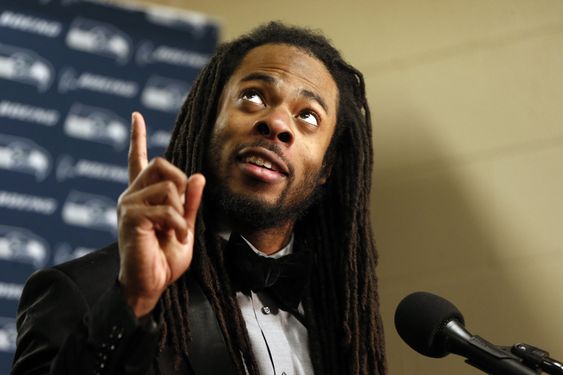 Richard Sherman points up during a post game news conference after an NFL wild-card football game against the Minnesota Vikings Sunday Jan. 10 2016 in Minneapolis. The Seahawks won 10-9