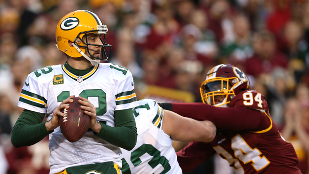 LANDOVER MD- JANUARY 10 Quarterback Aaron Rodgers #12 of the Green Bay Packers in action against the Washington Redskins during the NFC Wild Card Playoff game at FedExField