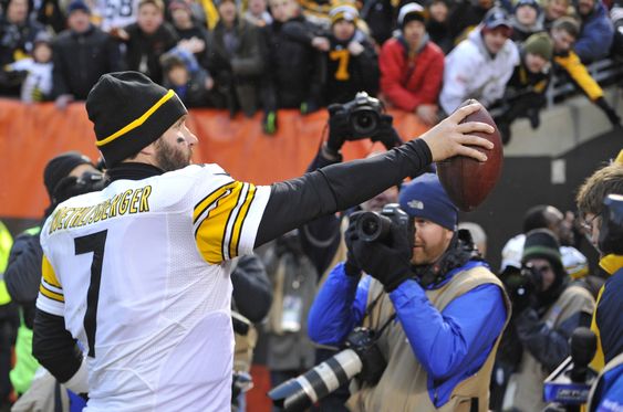 Ben Roethlisberger hands the ball to a fan after the Steelers defeated the Cleveland Browns 28-12 in an NFL football game Sunday Jan. 3 2016 in Cleveland