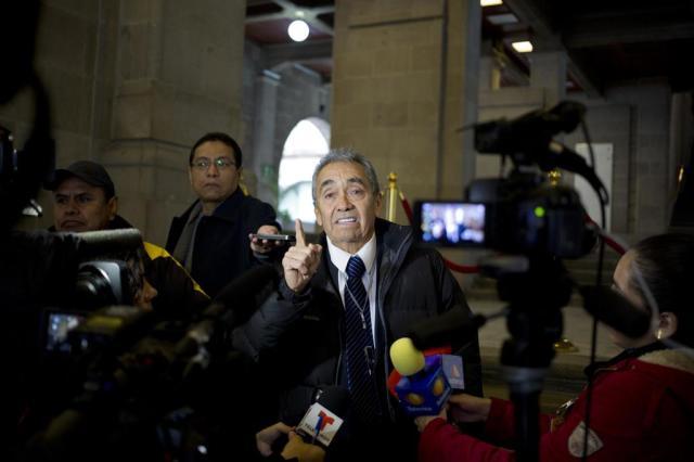 Lawyer Jose Gonzalez talks to the press after requesting an injunction to stop the extradition of arrested drug lord Joaquin'El Chapo Guzman at the Supreme Court in Mexico City Wednesday Jan. 13 2016. Gonzalez said he submitted the injunction at the