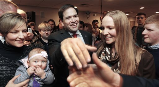 Sen. Marco Rubio R-Fla. shakes hands during a town hall in New Hampshire on Friday