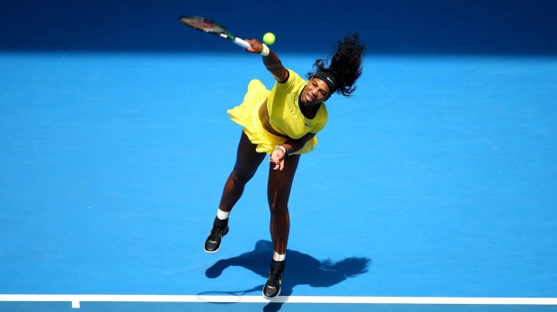 Serena Williams of the United States serves in her first-round match against Camila Giorgi of Italy