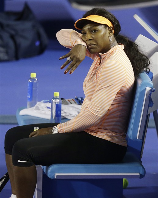 Serena Williams of the US talks wipes sweat from her face during a practice session on Rod Laver Arena ahead of the Australian Open tennis championships in Melbourne Australia Thursday Jan. 14 2016