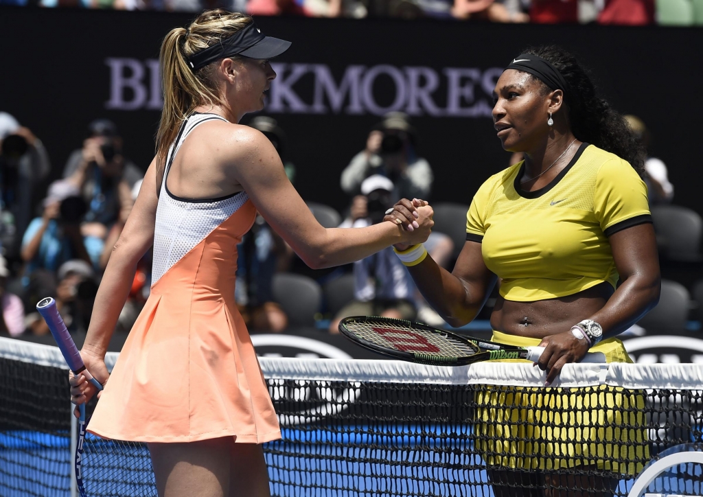 Serena Williams right of the United States is congratulated by Maria Sharapova of Russia after winning their quarterfinal match at the Australian Open tennis championships in Melbourne Australia Tuesday Jan. 26 2016.. (537