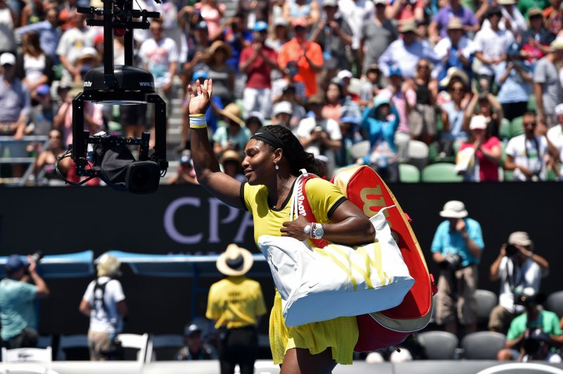 Serena Williams leaves the court after her victory against Maria Sharapova during the women's singles. Williams will meet Agnieszka Radwanska for a place in the finals. – AFP pic