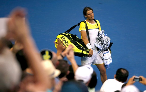 Rafael Nadal of Spain leaves Rod Laver Arena after losing to compatriot Fernando Verdasco in their first round match at the Australian Open tennis championships in Melbourne Australia Tuesday Jan. 19 2016