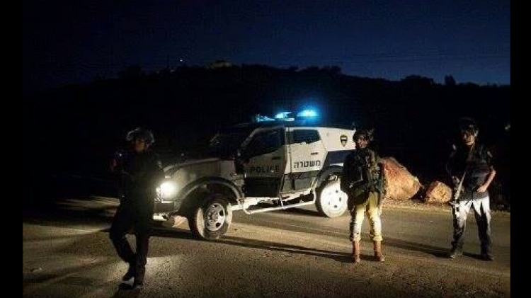 Police set up roadblocks as they search for the suspect who fled the scene of a fatal stabbing in Otni'el