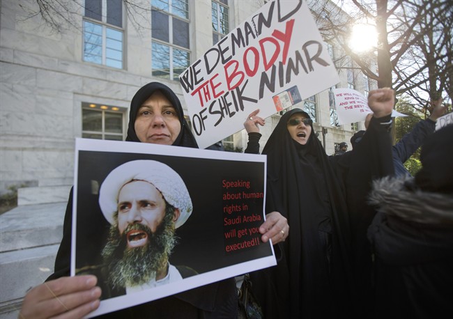 Amel Al-Hajjar left and Khadija Falih both from Iraq participate in a rally in front of the Saudi Arabian embassy in Washington Tuesday Jan. 5 2016 to protest the mass executions in Saudi Arabia. Saudi Arabia executed last Saturday Shiite cleric