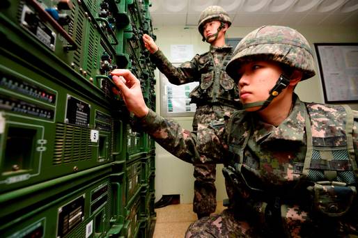 South Korean soldiers adjust equipment at a broadcasting room as they prepare propaganda broadcasts near the border area between South Korea and North Korea in Yeoncheon northeast of Seoul