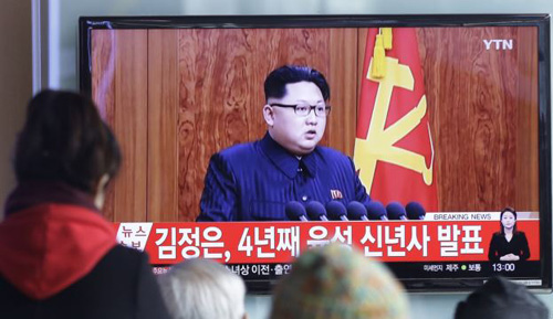 South Koreans watch a TV news program showing North Korean leader Kim Jong-uns New Year speech in Seoul on Jan. 1 2016. /AP