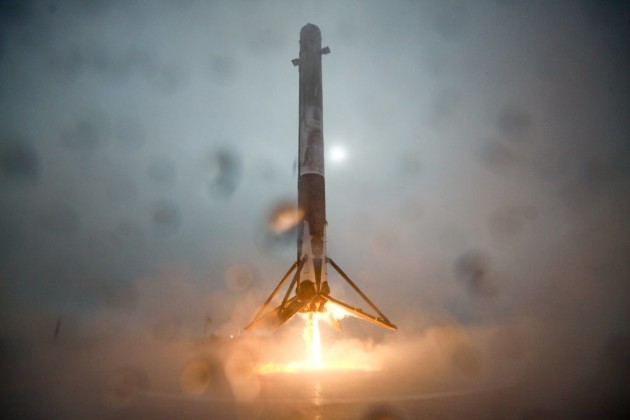 SpaceX's Falcon 9 first-stage rocket booster descends toward a landing on an oceangoing platform in the Pacific Ocean after the Jason 3 launch. SpaceX says the rocket tipped over due to a landing-leg failure