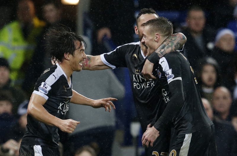 Shinji Okazaki celebrates scoring the third goal for Leicester with Jamie Vardy and Marcin Wasilewski