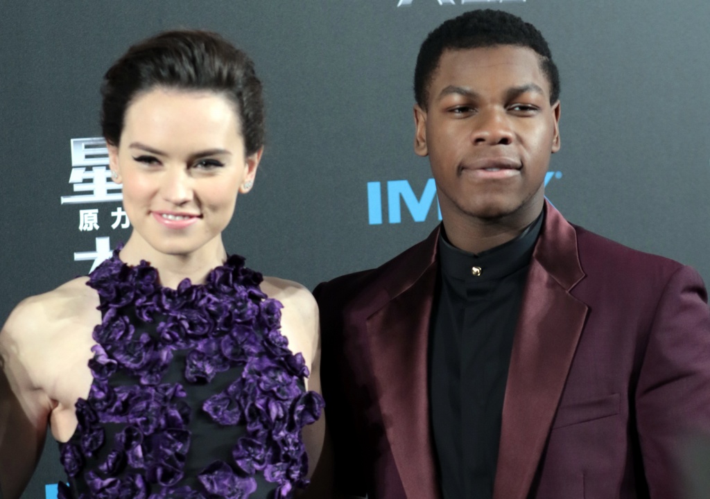 SHANGHAI CHINA- DECEMBER 27 Actress Daisy Ridley and actor John Boyega attend'Star Wars The Force Awakens premiere at Shanghai Grand Theatre