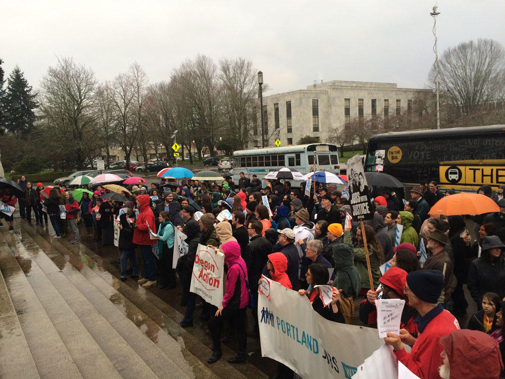 Supporters of a higher minimum wage rallied outside the Oregon Capitol Thursday