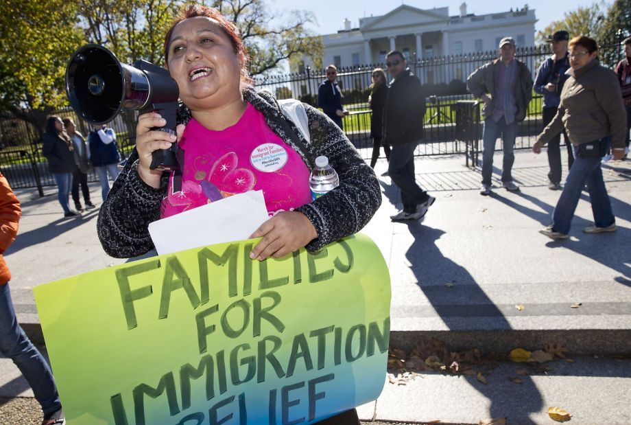 Ingrid Vaca originally of Bolivia speaks last year during a rally for immigration reform in front of the White House in Washington. The Supreme Court has agreed to an election-year review of President Obama’s executive orders to allow up to 5 million