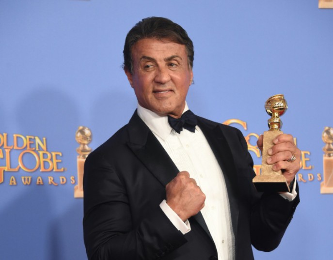 AFP  Frederic J Brown Sylvester Stallone poses in the press room with his award for Best Supporting Actor at the 73nd annual Golden Globe Awards