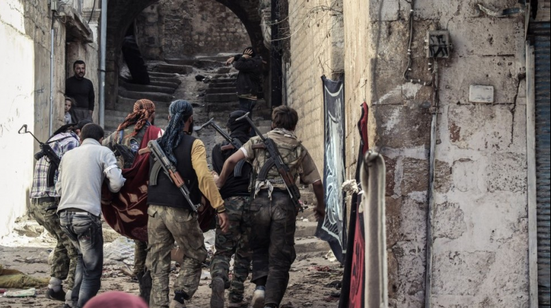 Syrian rebels in the streets of Harem