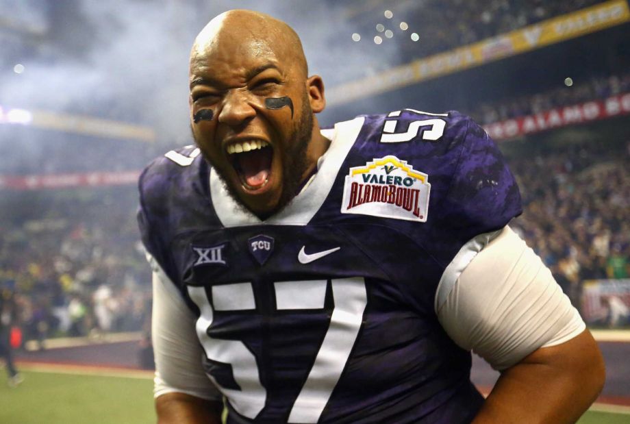 SAN ANTONIO TX- JANUARY 02 Davion Pierson #57 of the TCU Horned Frogs celebrates after winning the Valero Alamo Bowl in three overtimes against the Oregon Ducks at Alamodome