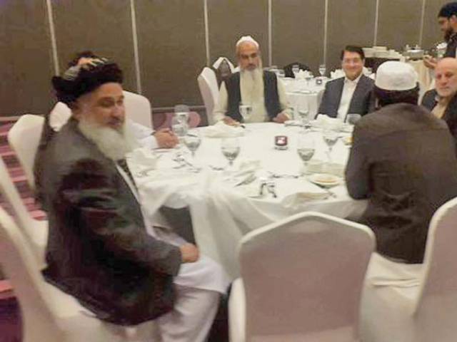 Former Afghan ministers Umar Daudzai and Anwarul Haq Ahadi in a meeting with Taliban representatives Sher Abbas Stanekzai and Abdul Salam Hanafi during the Pugwash conference in Doha