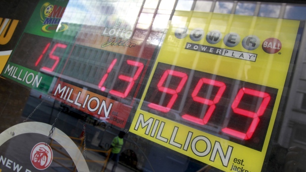 The $1.4-billion Powerball jackpot is so unusual that billboards and other signs around the U.S. have to advertise it as sitting at $999 million