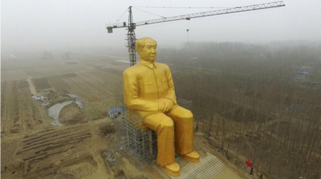 The 37 metre-high statue is painted gold