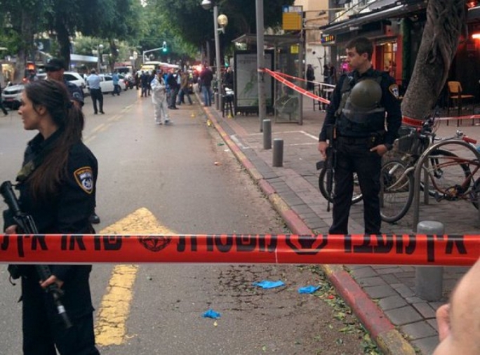 The suspected attacker who killed three people on New Year's day in Tel Aviv has been shot by the police