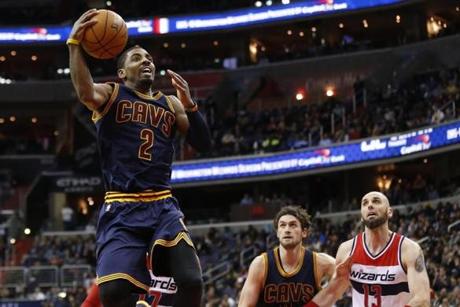 Jan 6 2016 Washington DC USA Cleveland Cavaliers guard Kyrie Irving shoots the ball as Washington Wizards center Marcin Gortat looks on in the second quarter at Verizon Center. The Cavaliers won 121-115. Mandatory Credit Geoff Burke-USA TOD