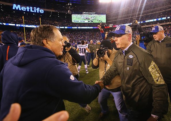 Tom Coughlin meets Bill Belichick after the Patriots 27-26 win at Met Life Stadium on Nov. 15