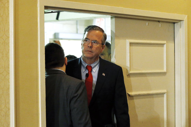 Republican presidential candidate former Florida Gov. Jeb Bush waits to speak Saturday Jan. 23 2016 at the New Hampshire Republican Party summit in Nashua N.H