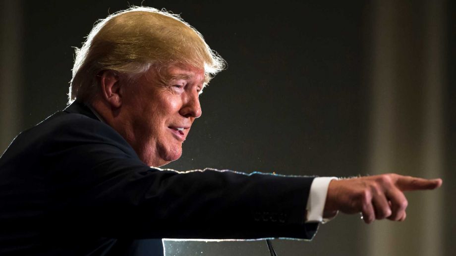 Republican presidential candidate Donald Trump points to the crowd while speaking at a campaign stop in Hilton Head Island S.C. Wednesday Dec. 30 2015