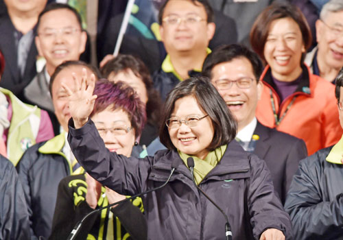 Tsai Ing-wen waves to a crowd in Taipei on January 16 after being elected president of Taiwan. AFP