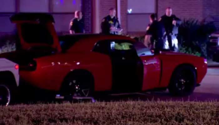 Two men wanted to test drive a Dodge Challenger. The salesman shot one of the suspects during a struggle