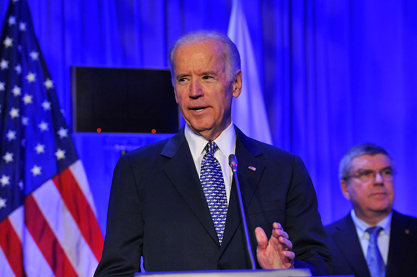 WASHINGTON DC- OCTOBER 30 U.S. Vice President Joe Biden speaks on the final day of the XX ANOC General Assembly 2015 while IOC President Thomas Bach looks on at the Hilton Hotel