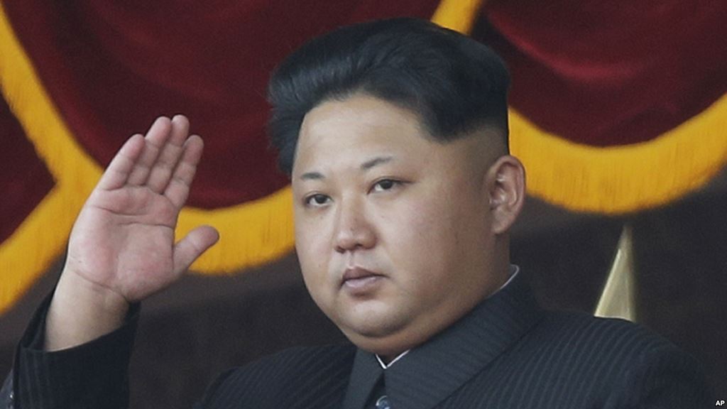 FILE- North Korean leader Kim Jong Un shown watching a military parade in Pyongyang in October says his country's recent nuclear test was'the legitimate right of a sovereign state and a fair action that nobody can criticize